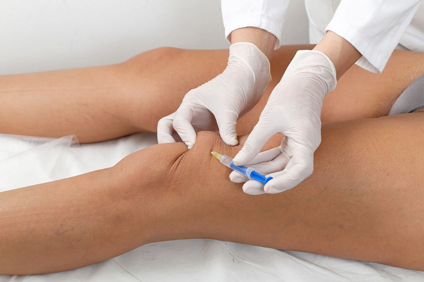 29910531 - woman having botox treatment at beauty clinic